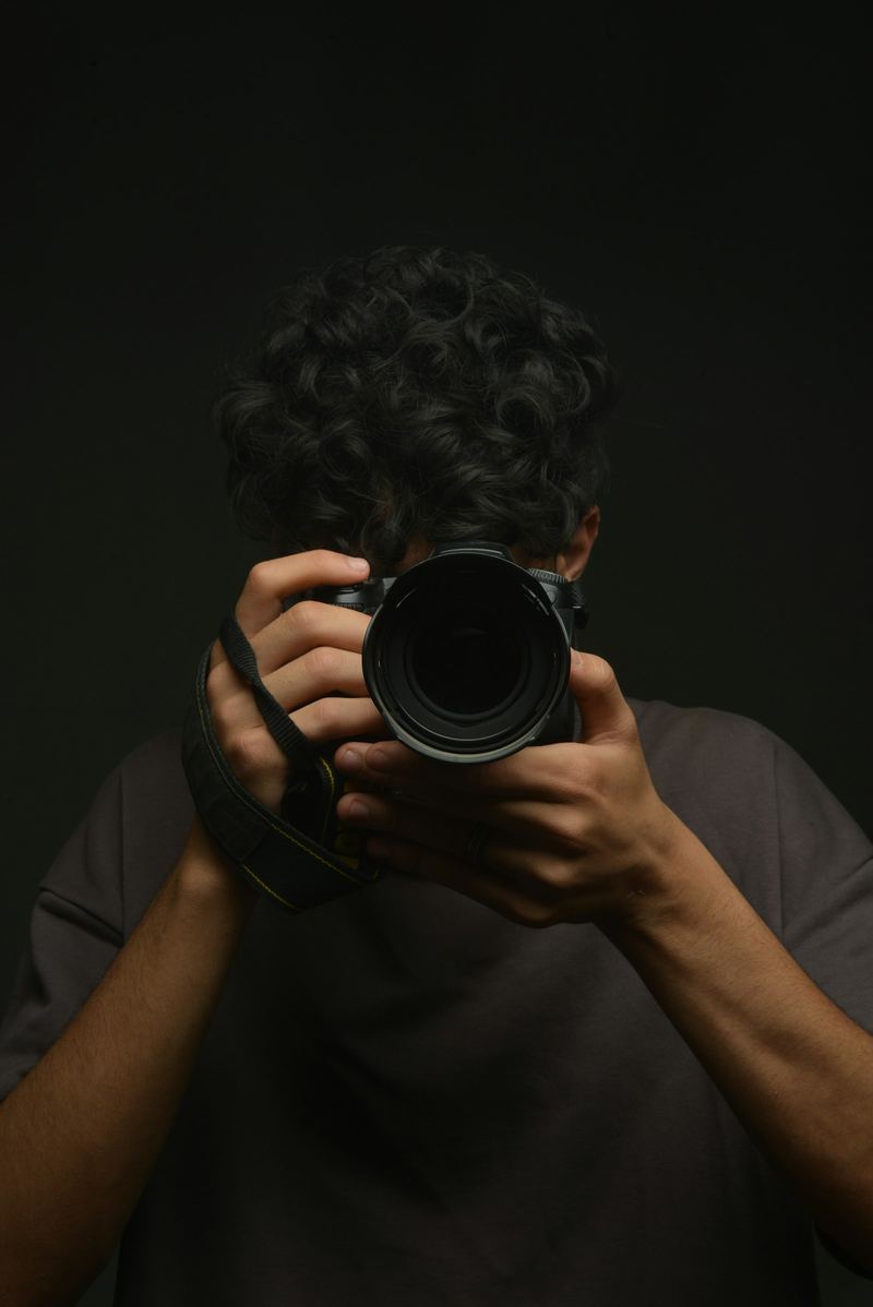 Photographer with his camera